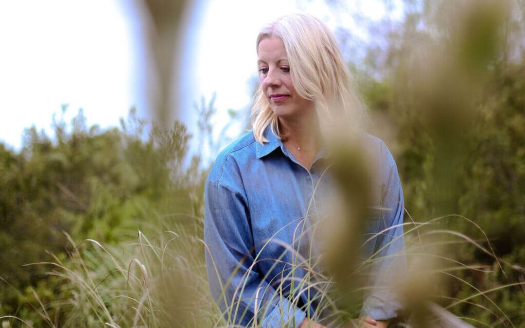 Jolene Park sitting in a peaceful, natural setting
